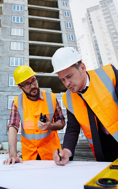 Beverly Hills Construction team reviewing plans on site